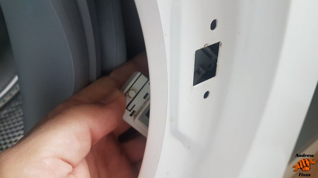 Picture showing Bosch washing machine door lock removal
